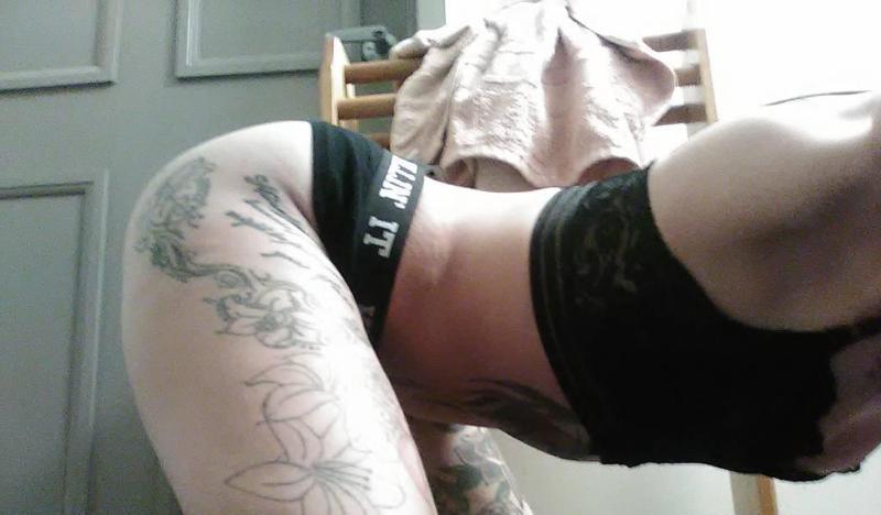 tanned tight and tattooed