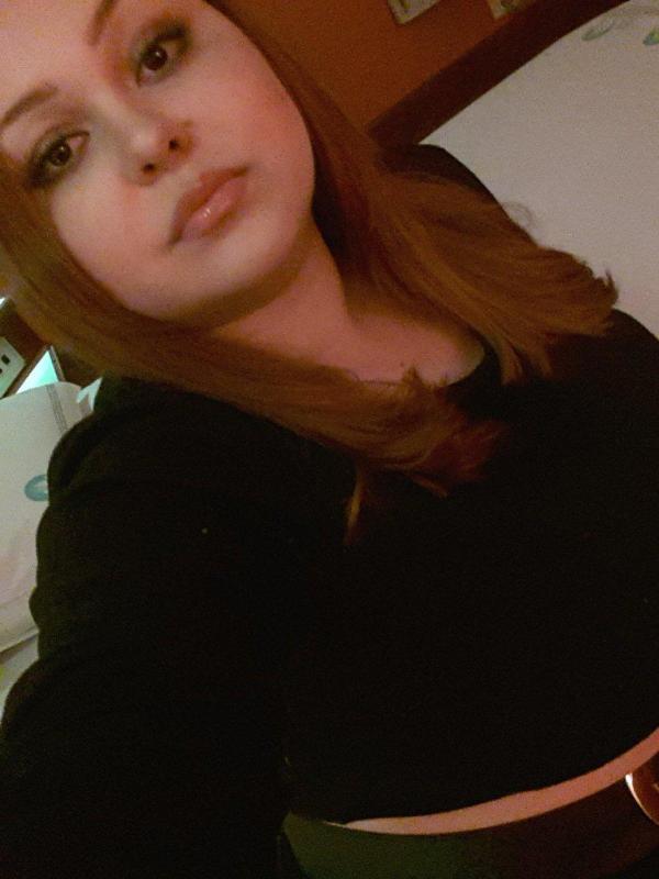 Young and sexy looking satisfying lady